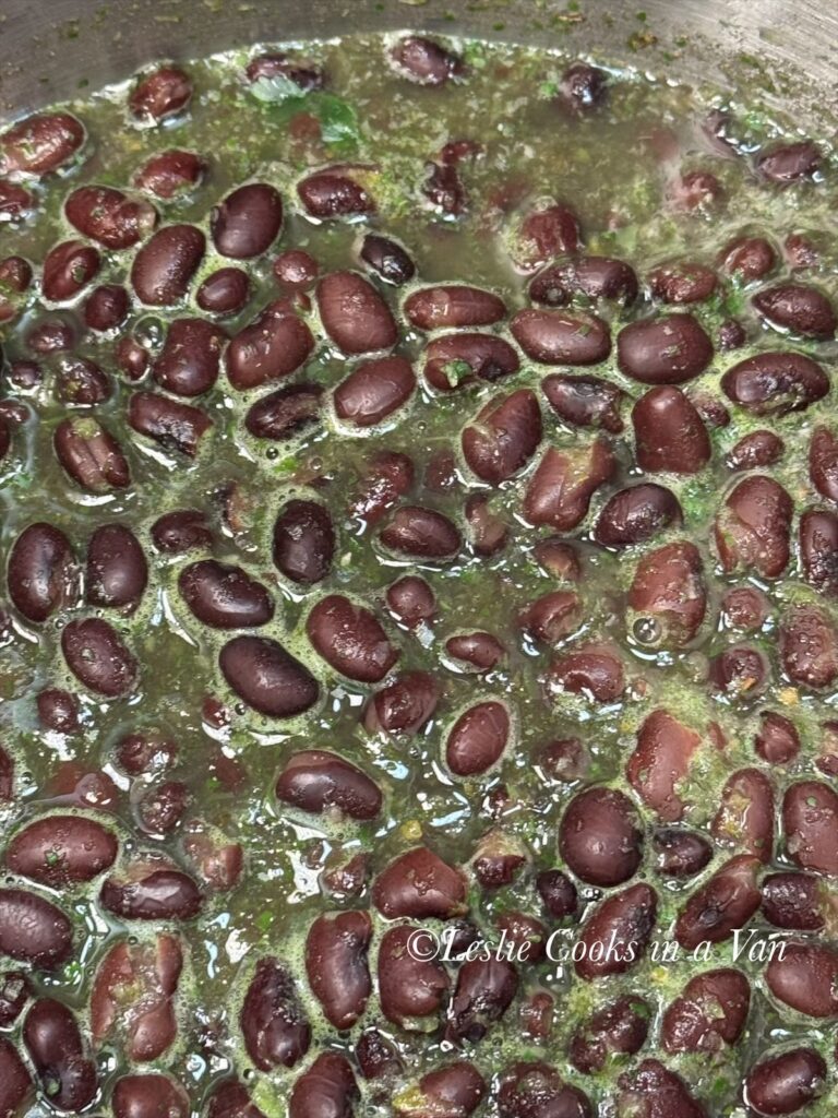 beans cooking in sofrito